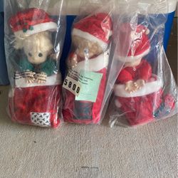 Precious Moments Santa collection dolls