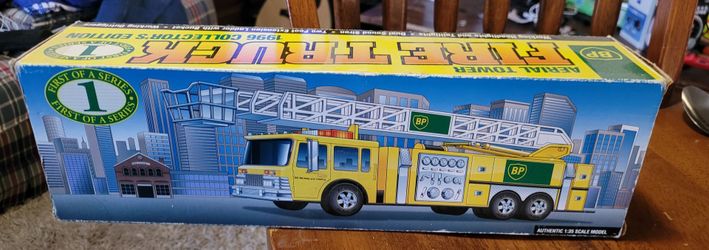 BP Aerial Toy Fire Truck Lights Sounds Works in Box