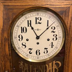 HOWARD MILLER(  calendar clock) X CLOCK COMPANY ZEELAND. MICHIGAN U.S.A