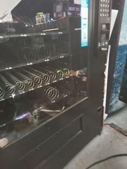 Used snack and drinks vending machine.