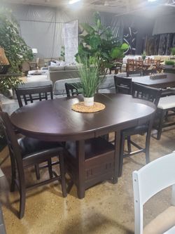 5 pc oval that turns into circle dining set (NEW)