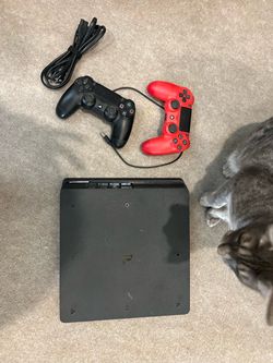 PS4 and two controllers