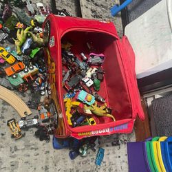 145 cars in the shop each a year a value between 3-4 dollars + the troller inside which are dinosaurs and a wooden track with the train the price is a