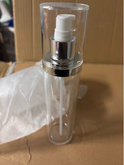 Clear acrylic and silver airless cosmetic pump bottle