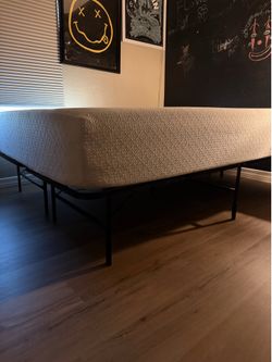 Queen gel filled mattress and black frame
