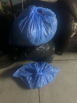 3 bags with clothes and shoes