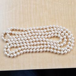Continues Strand Of Pearl Like Beads