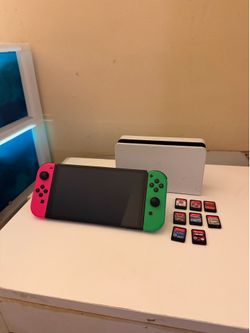 Nintendo Switch OLED Console Bundle – 8 Games Included