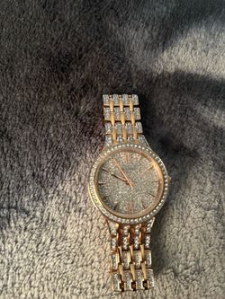 Women’s rose gold Bulova watch