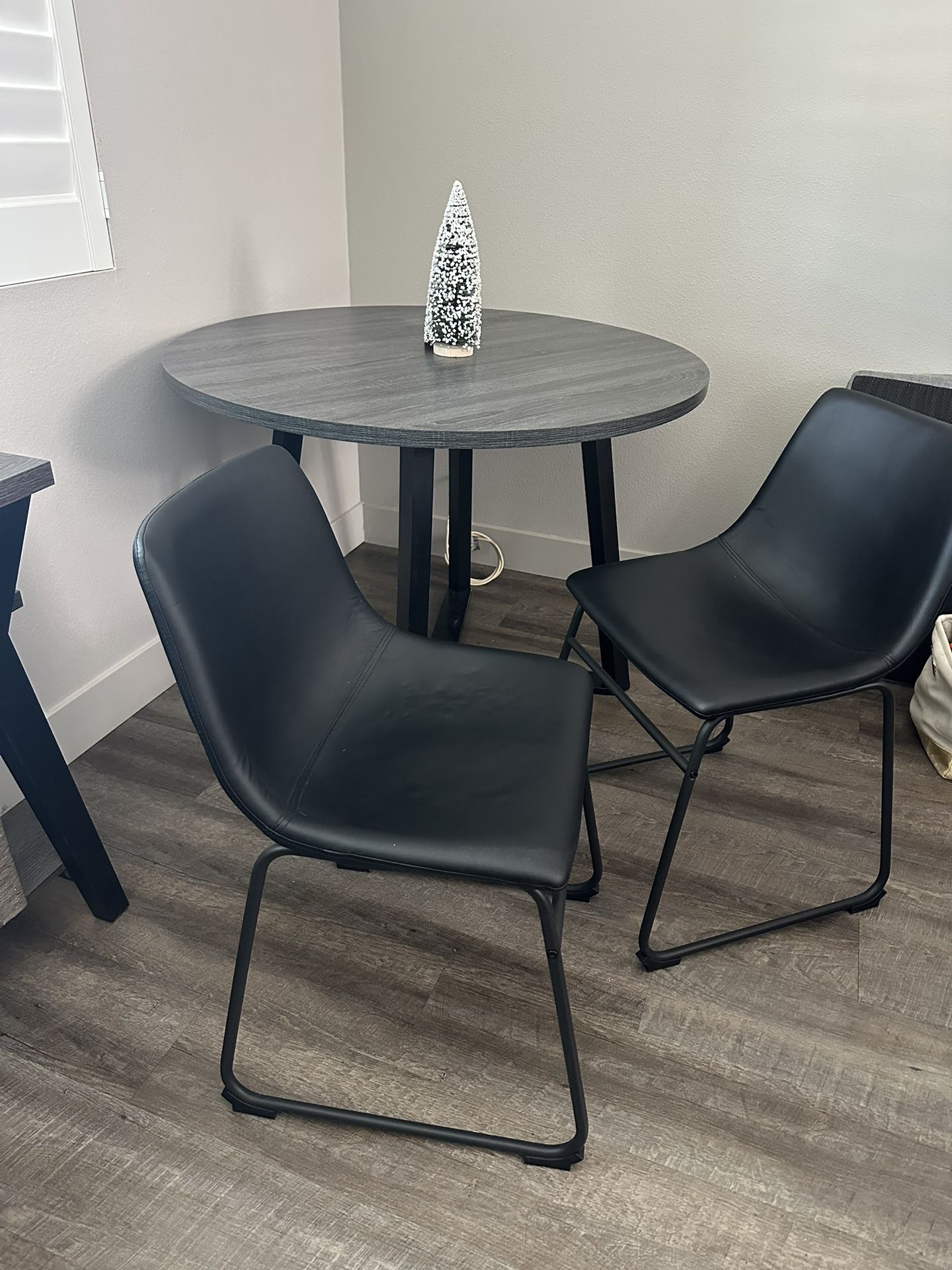 Round dining set with 4 chairs and side table