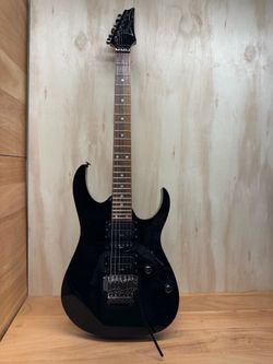 Beautiful Ibanez RG570 solid-body electric guitar in a black finish. (Recently Serviced)