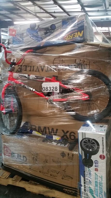 Pallet with hoverboard, bikes, 3 wheeled bike, nerf gun item and more