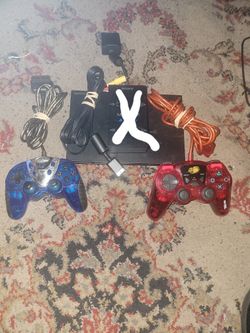 PlayStation  2 withTwo controllers(Av Cord Only, No Power Cord)