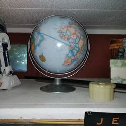 World Globe Roughly 13" Great Condition on Rotating Stand 