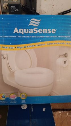 Raised toilet seat