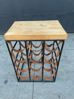Mid Century Iron and Leather Wine Rack with Butcher Block Top by Arthur Umanoff .