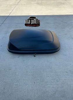 Rooftop cargo box carrier