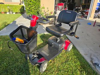 Red Mobility Scooter with Trailer