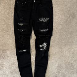 Amiri patchwork-distressed black Jean
