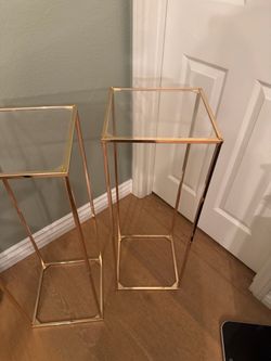 Selling - 2 Display Stand Tables. 31.5 inches tall. Gold Color. Used 2x