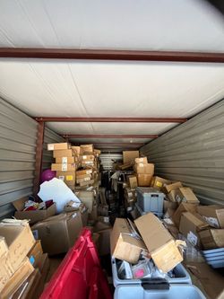 10x30 storage locker filled with brand new target clothing and merchandise