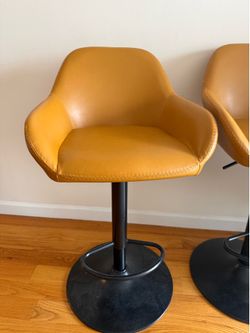 Two Leather Bar Chairs