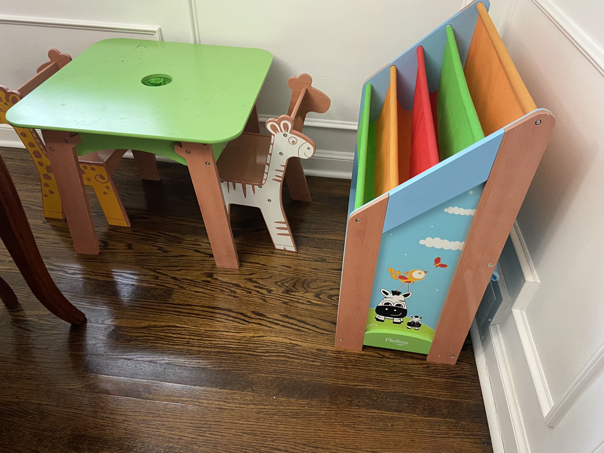 Toddler table with chairs and book shelf