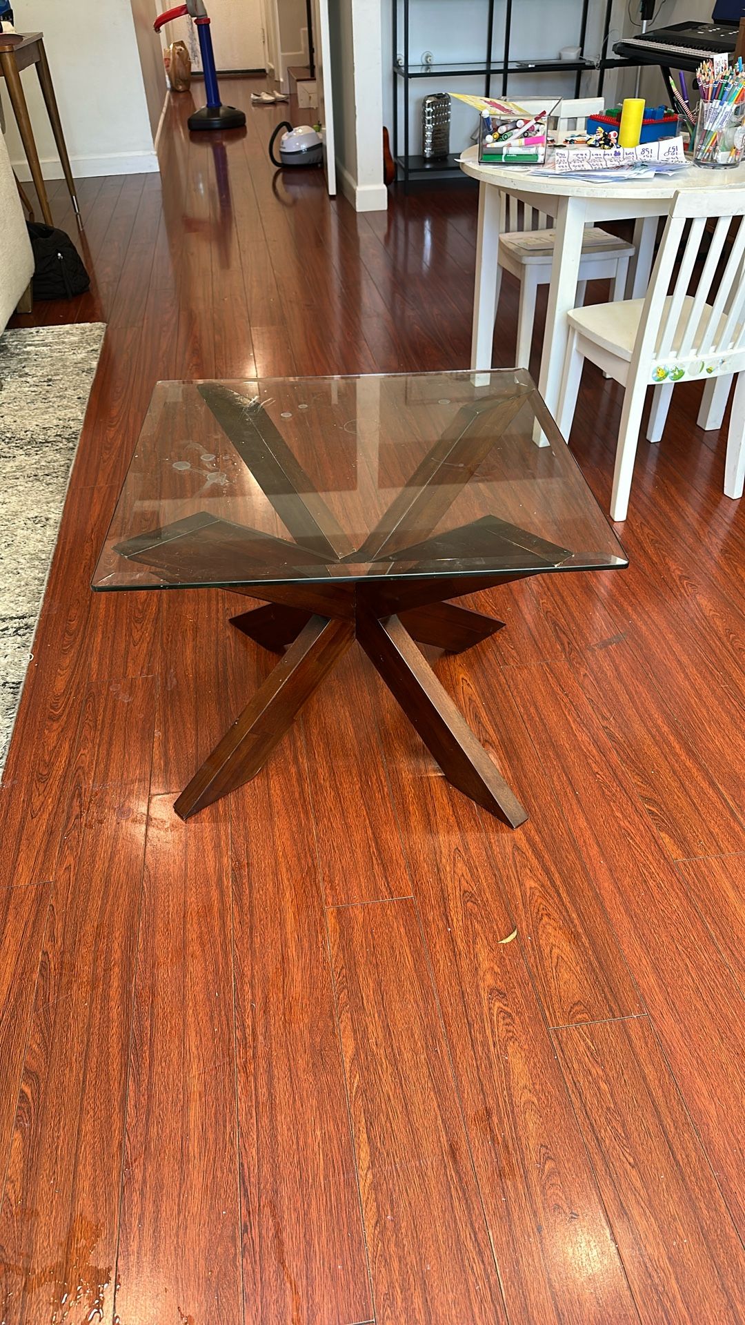 Glass And Wooden Leg End Table