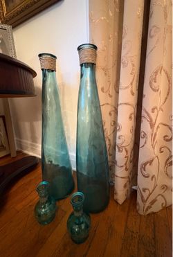 4 Glass vases blue