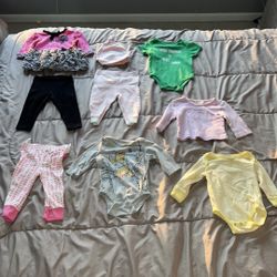 Baby girl clothes 3-6m. Baby essential dress. Juicy onesie has stain on back see pic. Baby guess shirt. Burt’s bees black pant & pink/white pants w ha