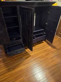 Dark wood entertainment center