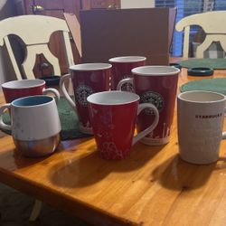 Seven Starbucks Coffee Cups 
