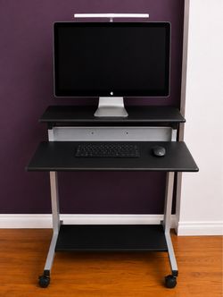 Adjustable desk with wheels.