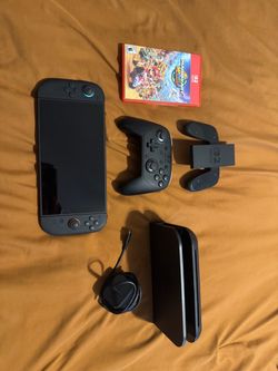 Nintendo Switch 2 with pro controller and Mario Kart