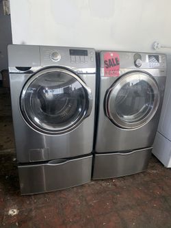 SALE- Samsung front loading steam washer & electric dryer set with pedestals in excellent conditions