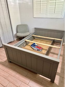 Full size wood bed with twin trundle