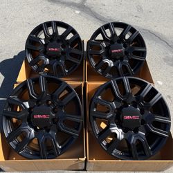 20” GMC Sierra original factory rims in new satin black