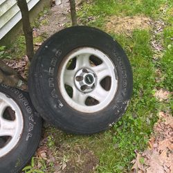 Old Tires With Jeep Wheel Parts/attached