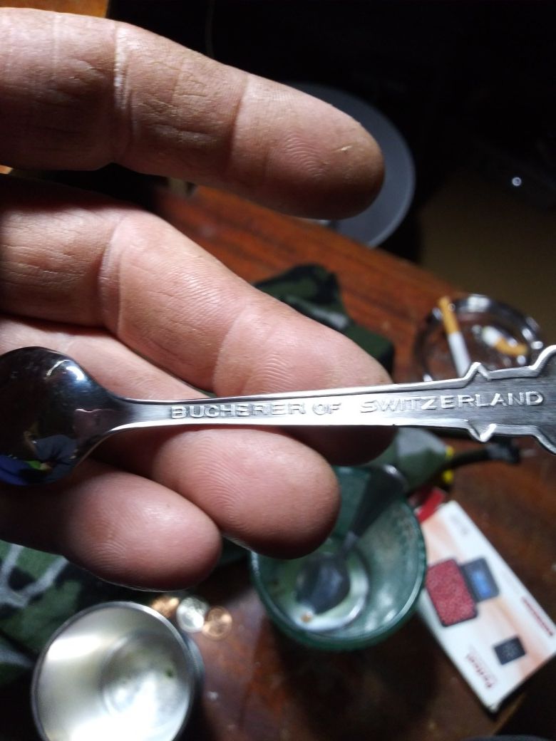 Miniature sterling silver Rolex spoon