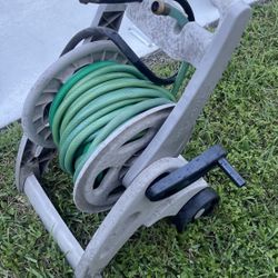 100 Feet Of Garden Hose And Caddy With Wheels