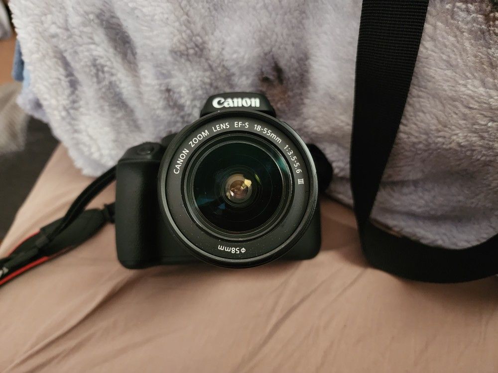 Canon EOS Rebel T100 Digital SLR Camera with 18-55mm Lens Kit, 18 Megapixel Sensor