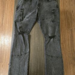 Purple Brand Tinted Worn Flare Cargo Jeans in black.