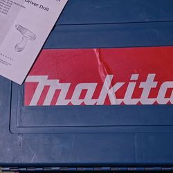 makita impact driver   screwgun 6337D with 2 14V batteries and charging station 