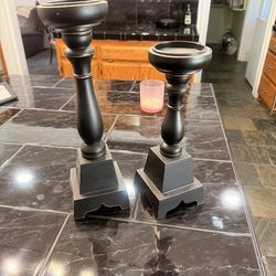 Two wooden candle holders