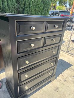 Black tall dresser