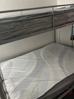 Bunk bed brand new plastic still on mattress