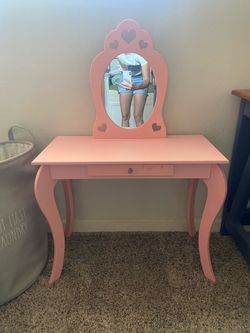 Little pink vanity table with mirror