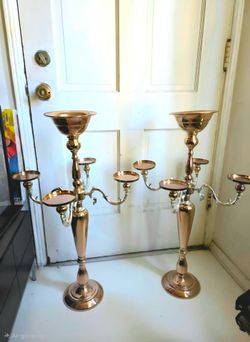 candelabras with a top centerpiece bowl
