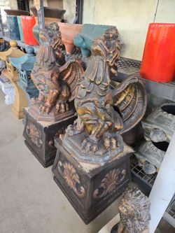 CONCRETE ENTRY GARGOYLE STATUES ON A PEDESTAL $850 A SET OF 2 (OVERALL HEIGHT 52" INCHES)