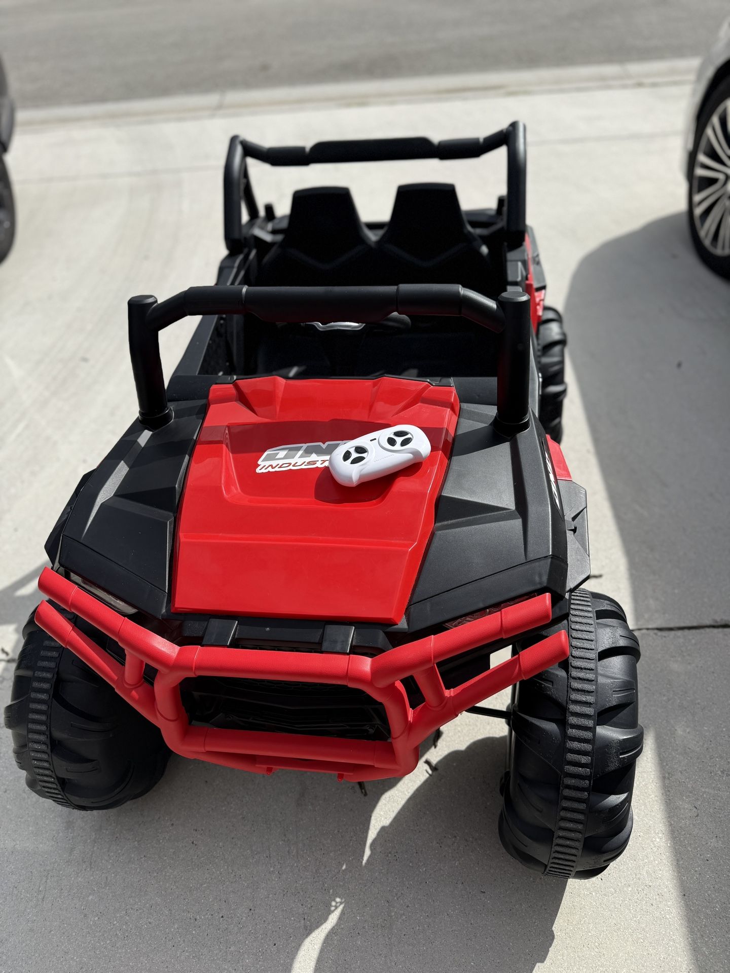 Two seater ride on car for kids with parental remote control